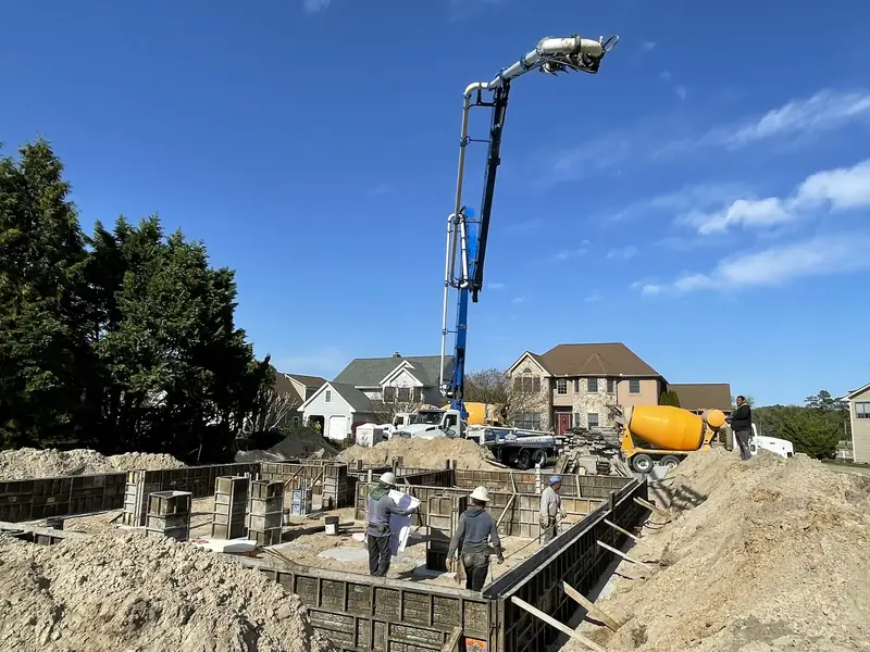 Concrete placement at a residential foundation